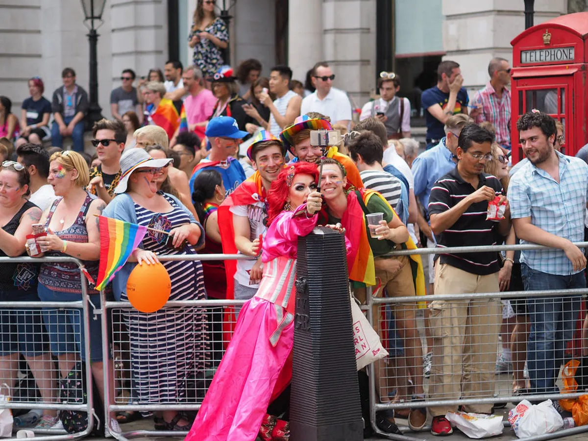 London Pride parade - rainbow flags waving high in the heart of the UK capital